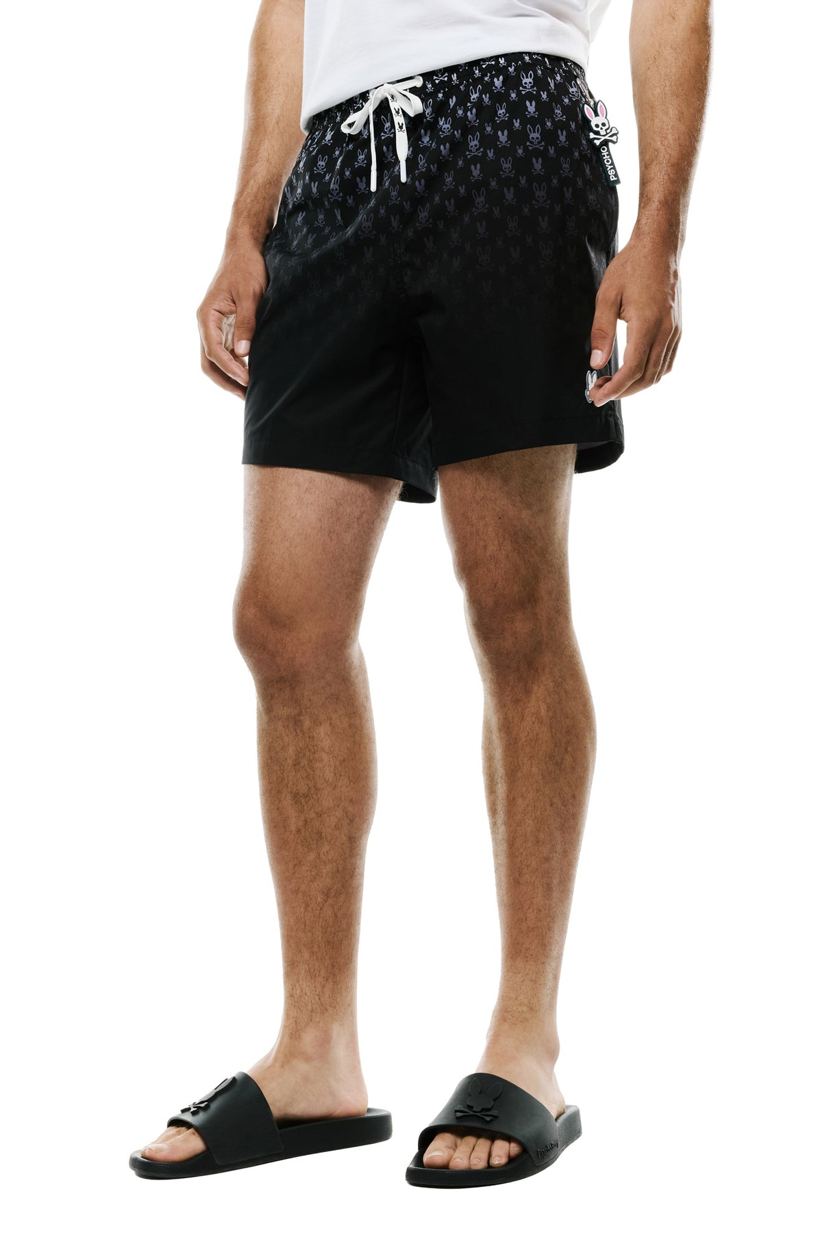 Short maillot de bain noir avec cordon blanc, motif lapin dégradé et étiquette côté pour homme par Psycho Bunny, de face