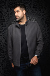 Men's charcoal gray zip bomber jacket on model, open front showing herringbone texture and stand collar by Au Noir