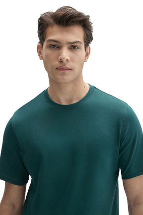 Men's close front view of a teal crewneck Short-sleeve T-Shirt showing the collar, shoulders, and by Robert Barakett