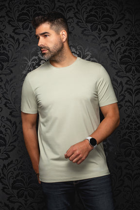 Men's pale sage green short sleeve crewneck T-Shirt on model, front view with straight hem by Au Noir