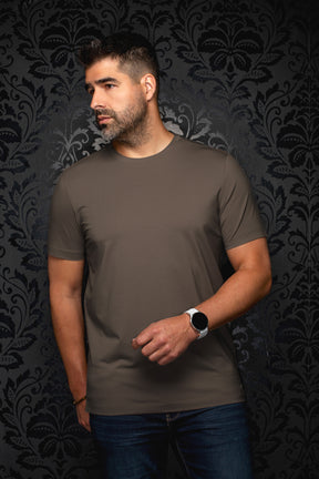 Men's brown Short-sleeve T-Shirt on model, with crewneck collar and straight hem visible, front view by Au Noir