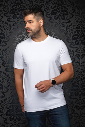 Front view of men's plain white crewneck Short-sleeve T-Shirt worn with jeans by Au Noir