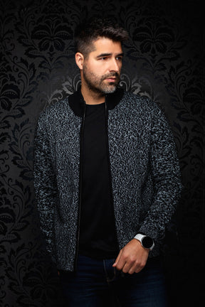 Au Noir men's black and light gray marled knit zip cashmere jacket with black ribbed collar shown from the front