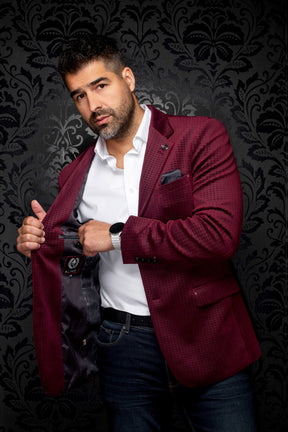 Men's angled view of burgundy micro-check blazer opened to show dark patterned lining and label, detail view by Au Noir