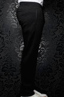 Vue de côté du pantalon jogging noir avec taille élastique, cordon et poche verticale pour homme par Au Noir