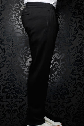 Vue de côté du pantalon jogging noir avec taille élastique, cordon et poche verticale pour homme par Au Noir