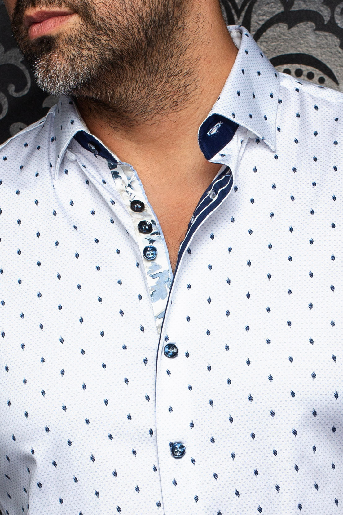 Au Noir men's white shirt collar, navy leaf print, contrast placket and dark buttons, close-up