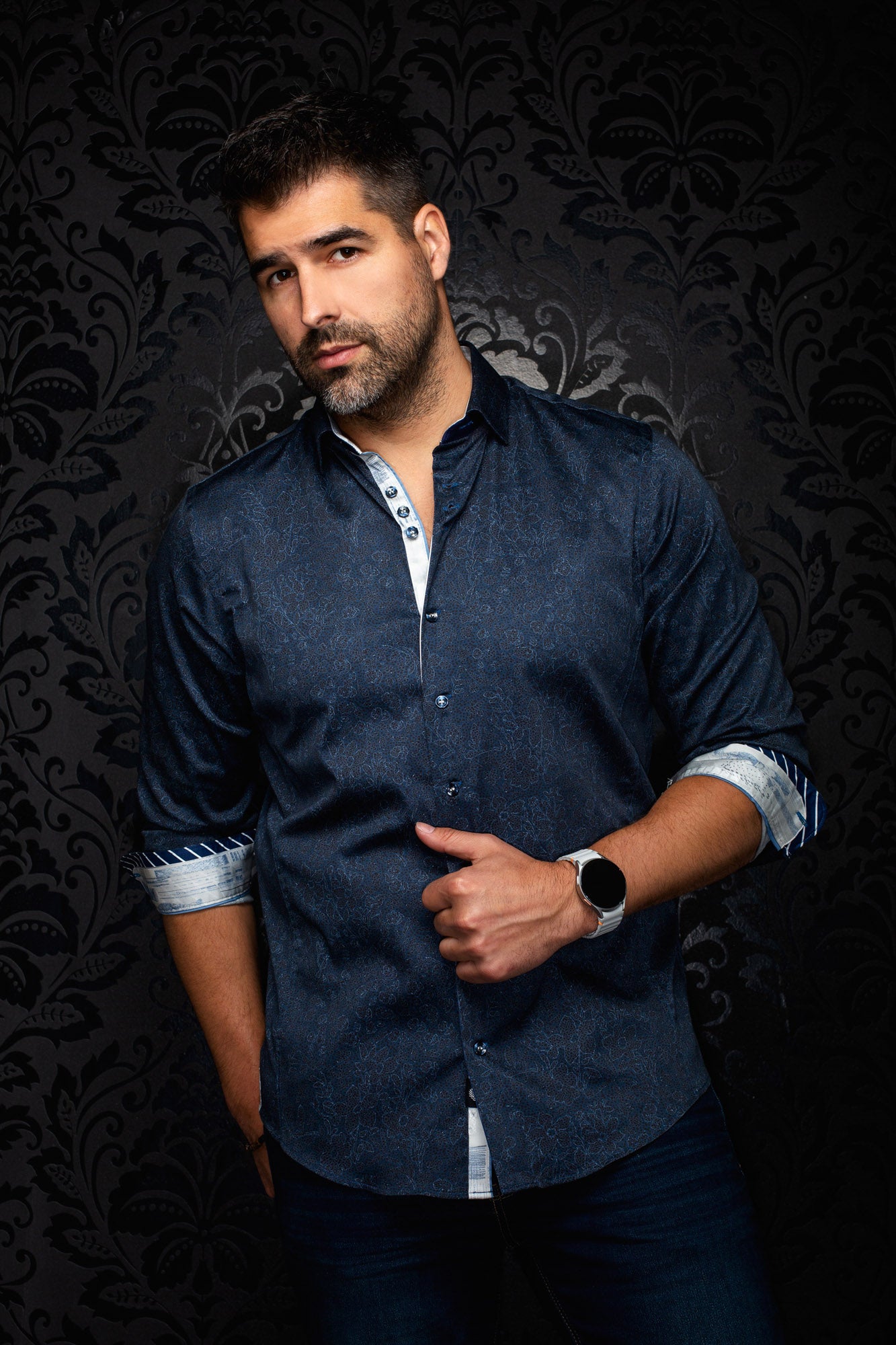 Au Noir men's navy patterned button-up shirt, front model view with rolled contrast cuffs and curved hem