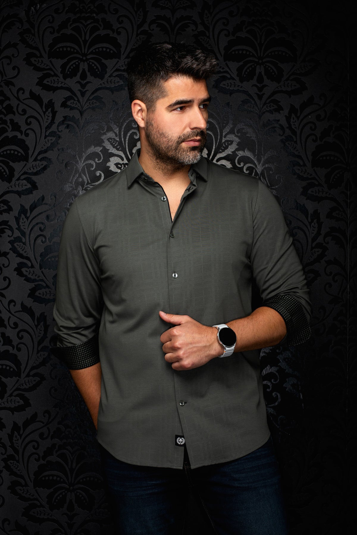 Au Noir men's olive green long sleeve button-up shirt, front view with rolled black contrast cuffs