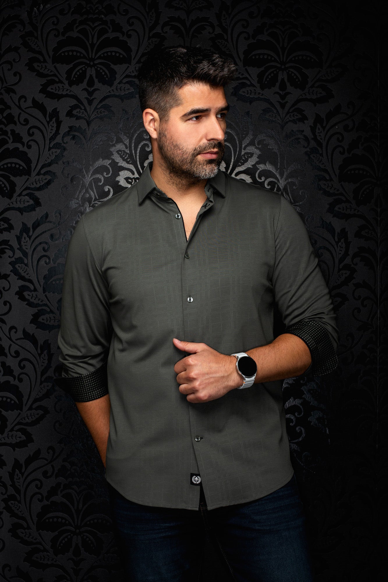 Au Noir men's olive green long sleeve button-up shirt, front view with rolled black contrast cuffs