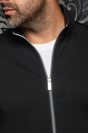 Au Noir men's black sport jacket stand collar and silver front zipper partially open over a white T-Shirt, close-up