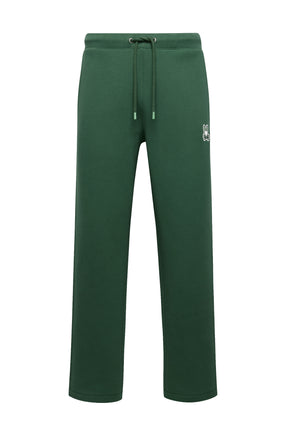 Pantalon jogging sport vert foncé à jambe large avec cordon et écusson lapin pour homme par Psycho Bunny, isolée de face