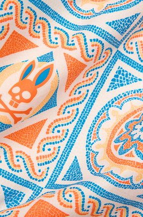Tissu crème à imprimé mosaïque orange et bleu avec motif tête de lapin pour homme par Psycho Bunny, en gros plan