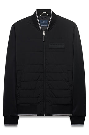Men's black zip-front windbreaker jacket with hem, cuffs, striped rib collar and quilted front, product view by Psycho Bunny