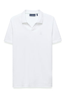 Men's white short sleeve polo shirt front view with ribbed collar and tonal chest logo by Psycho Bunny