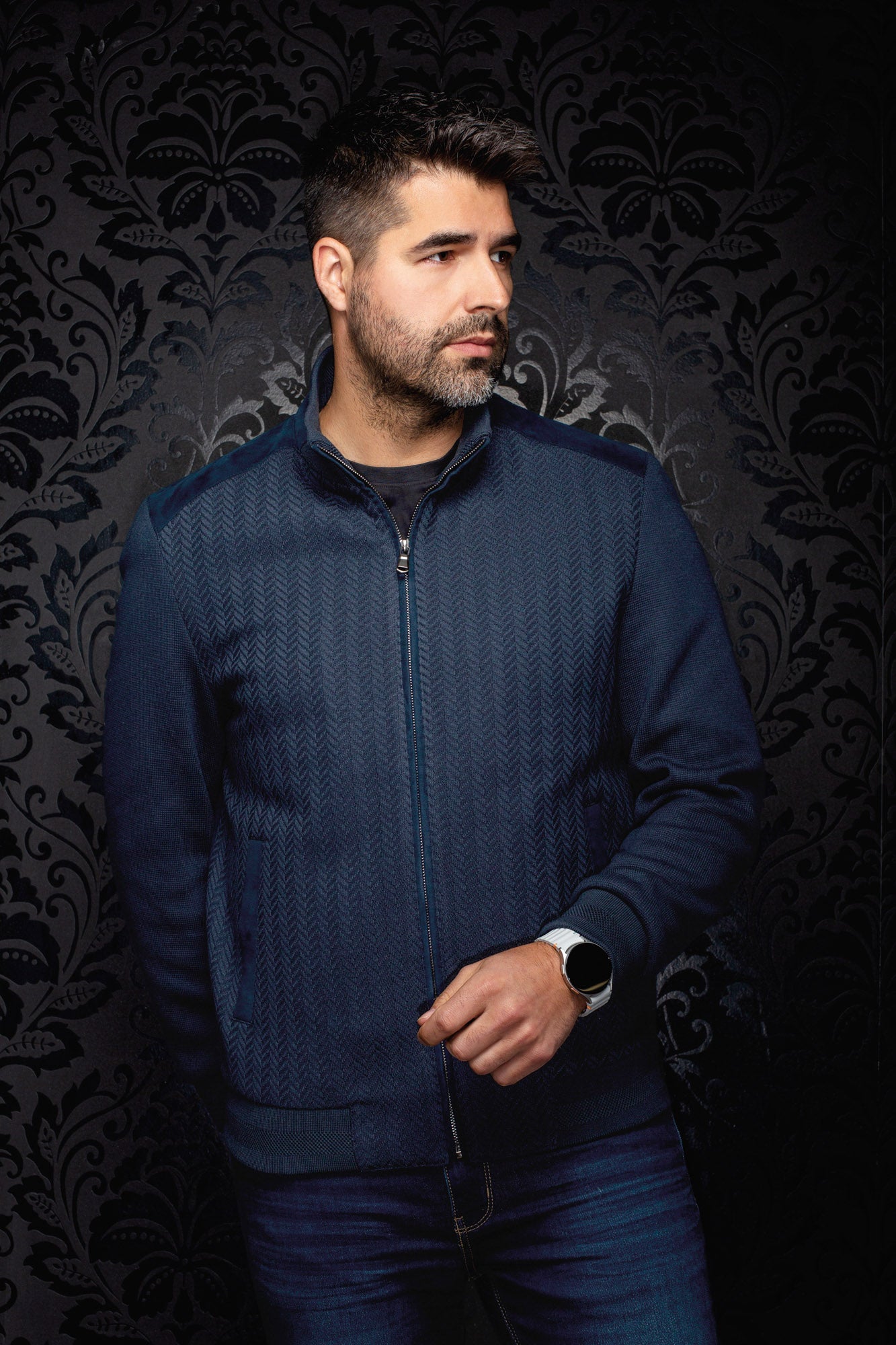 Men's navy bomber jacket zipped on model, front view with herringbone panels and ribbed sleeves by Au Noir