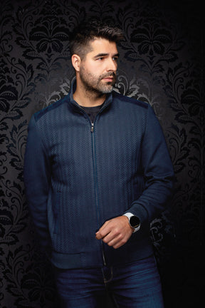 Men's navy bomber jacket zipped on model, front view with herringbone panels and ribbed sleeves by Au Noir