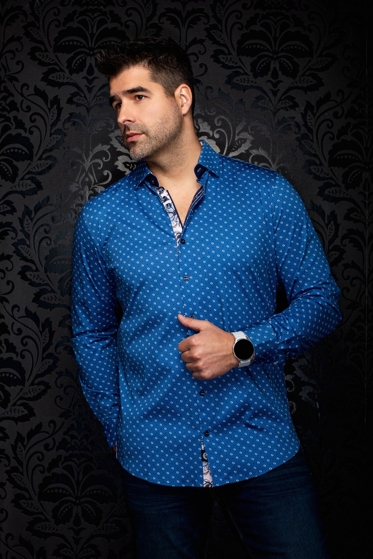 Men's blue patterned button-up shirt front view with open collar, long sleeves, and dark buttons by Au Noir