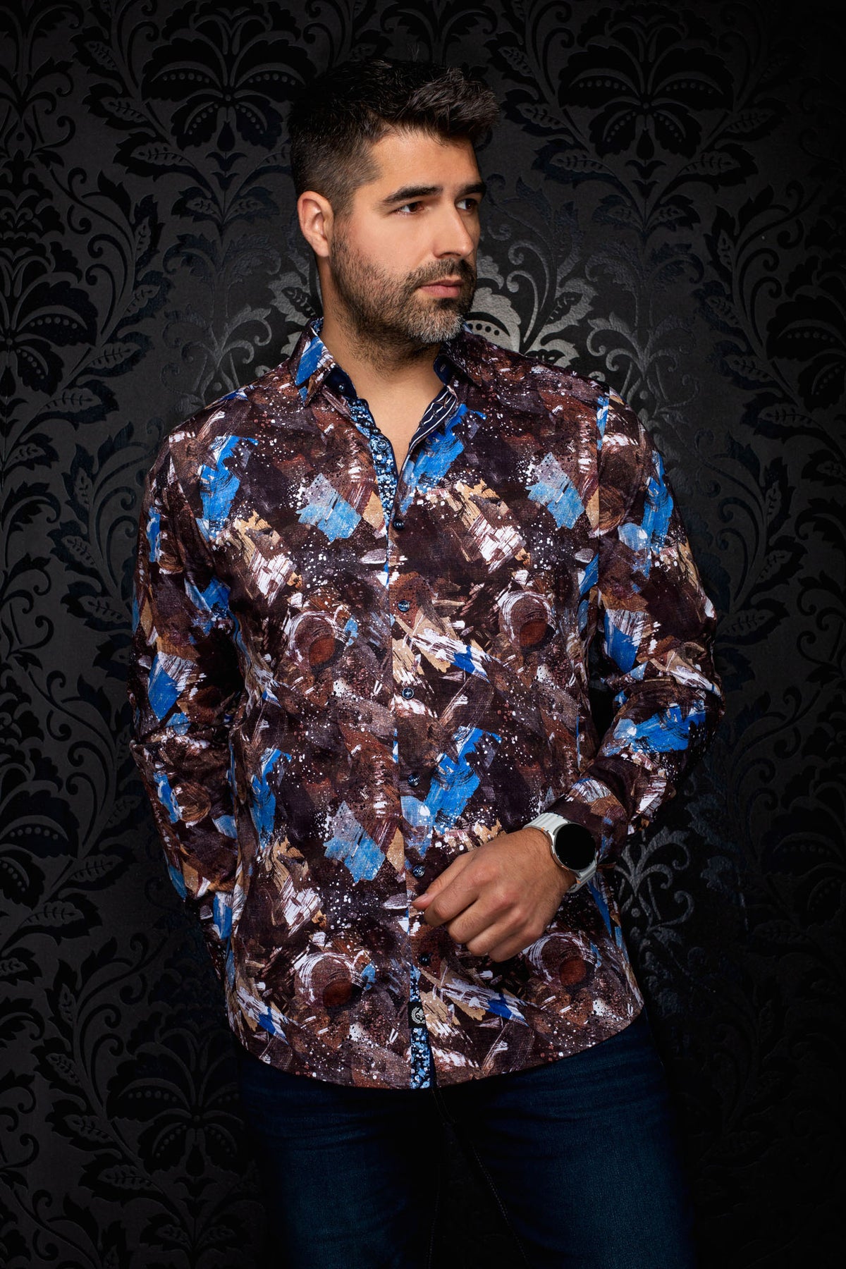 Front view of men's brown abstract print button-up shirt with blue accents and dark buttons by Au Noir