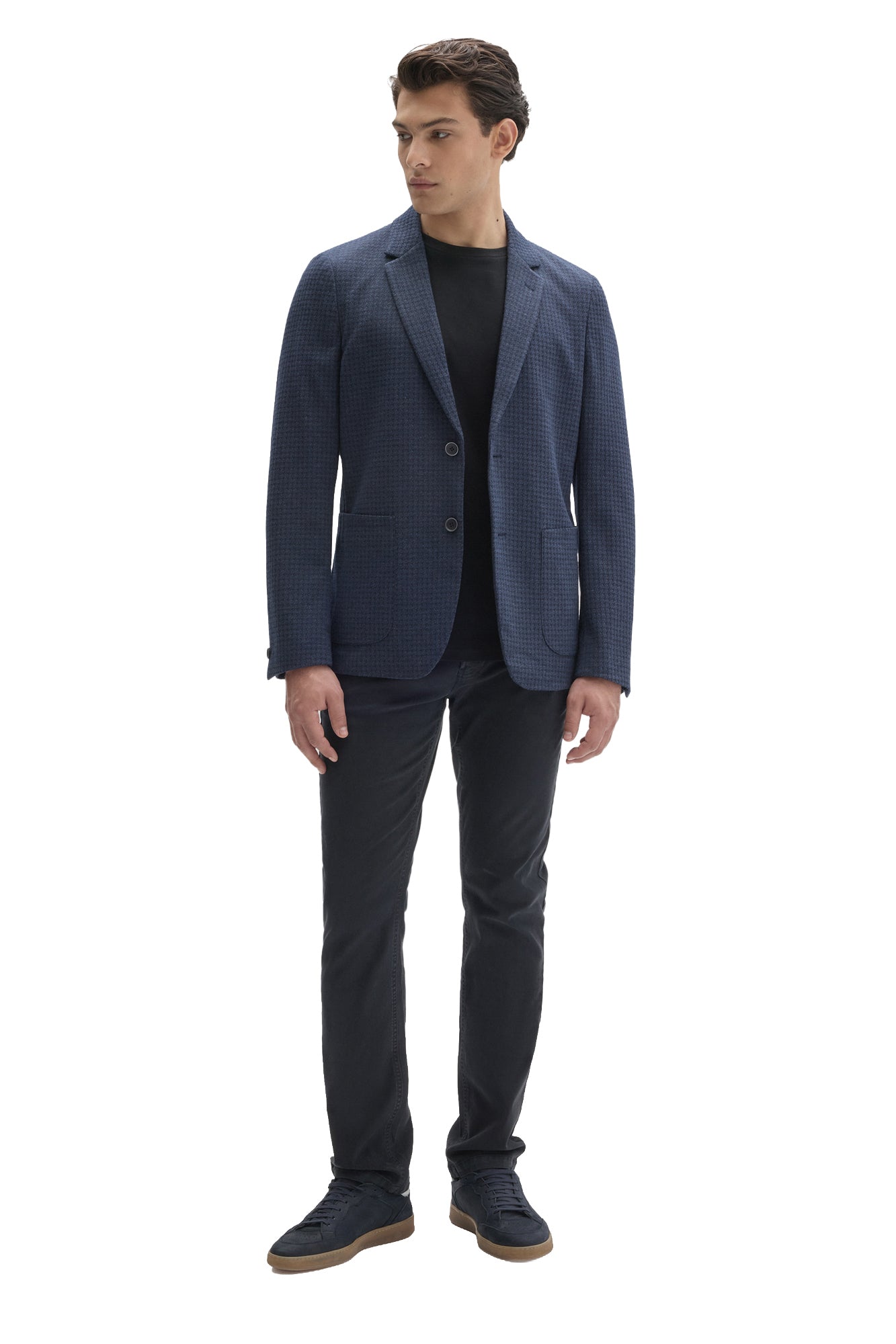 Men's full front view of navy textured sport blazer worn open over a black crewneck with dark pants by Robert Barakett