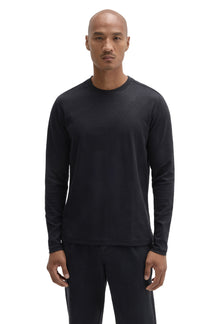 Front view of men's black long sleeve crew neck T-Shirt with tonal raised geometric texture by Robert Barakett