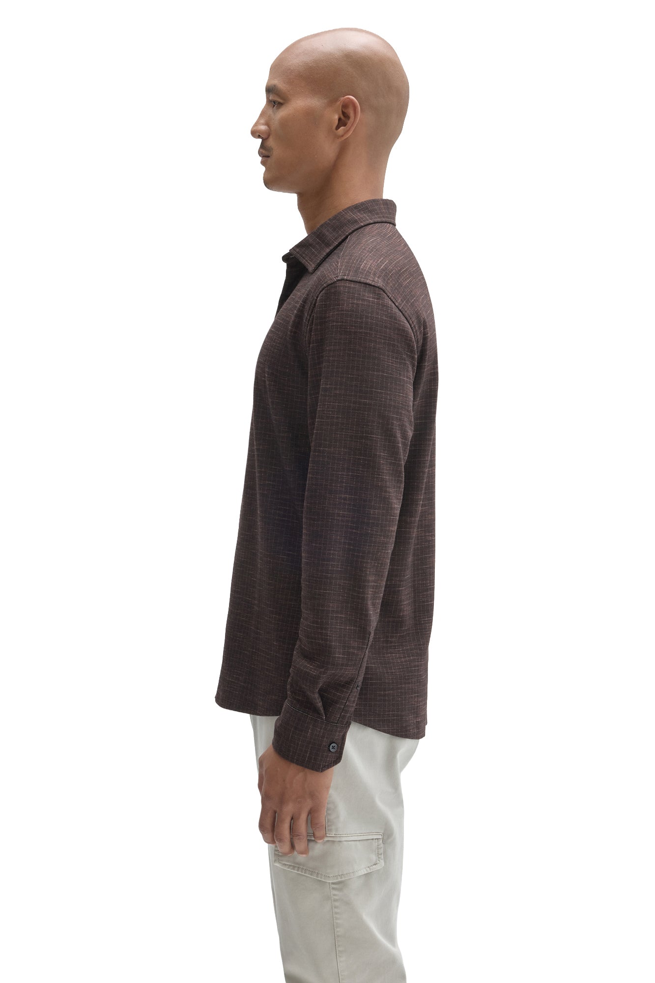 Robert Barakett men's dark brown long sleeve button-up shirt showing cuff button, shoulder seam and collar, side view