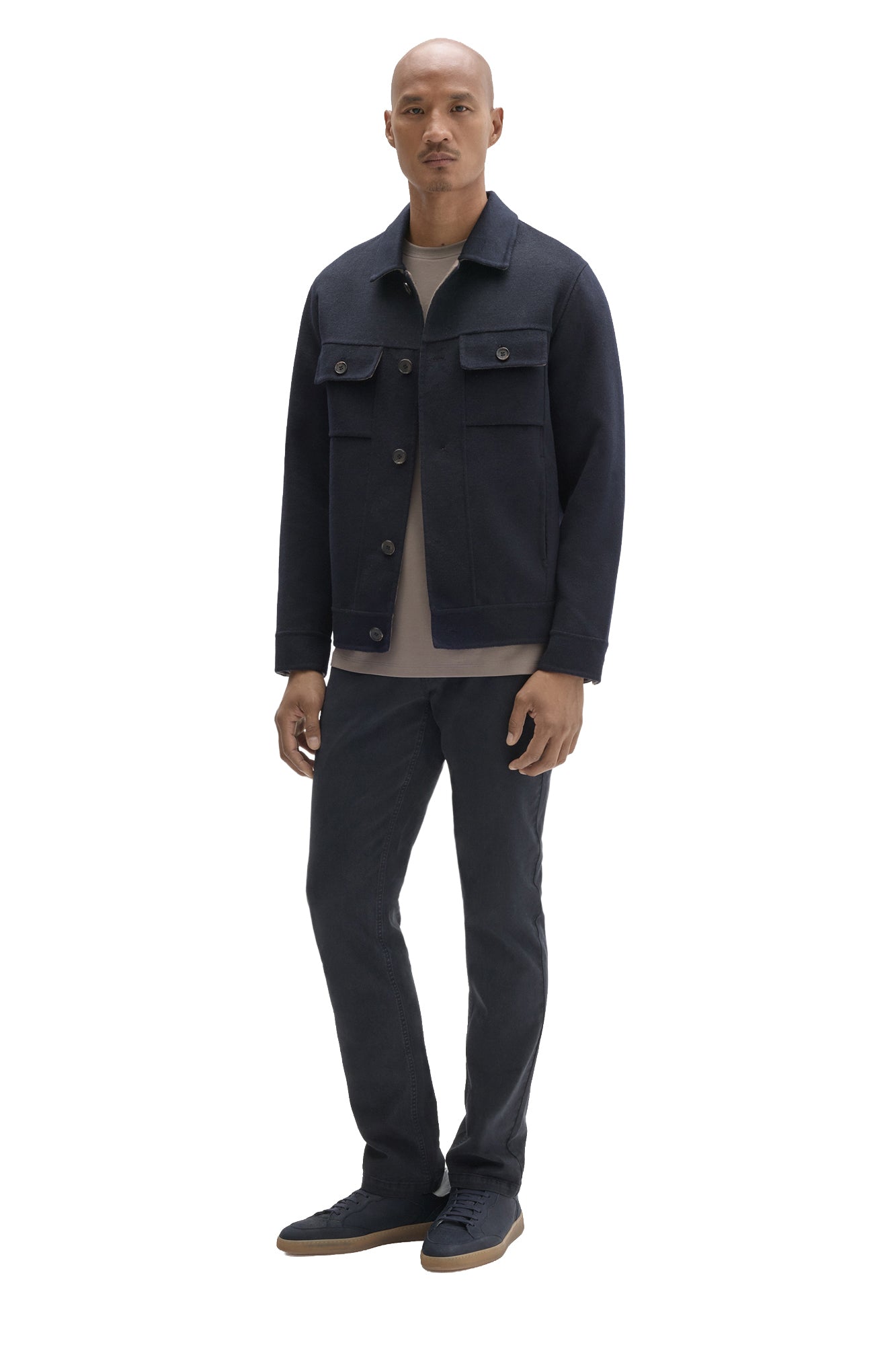 Men's full-length front view of dark navy button-front jacket styled over a light crewneck T-Shirt by Robert Barakett