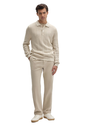 Robert Barakett men's full front view of a cream textured knit long-sleeve polo with, button placket and ribbed hem