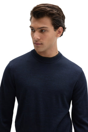 Robert Barakett men's close front detail of a navy fine-knit crewneck long-sleeve sweater showing the ribbed collar texture