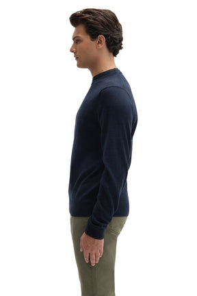 Robert Barakett men's navy long sleeve crewneck sweater showing ribbed hem and the shoulder seam, side view