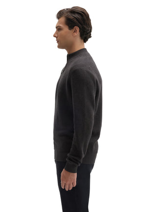 Robert Barakett men's dark charcoal quarter-zip knit long-sleeve sweater, side view showing ribbed cuffs and textured knit