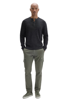 Robert Barakett men's full front view of dark charcoal henley long-sleeve knit sweater styled with olive cargo pants