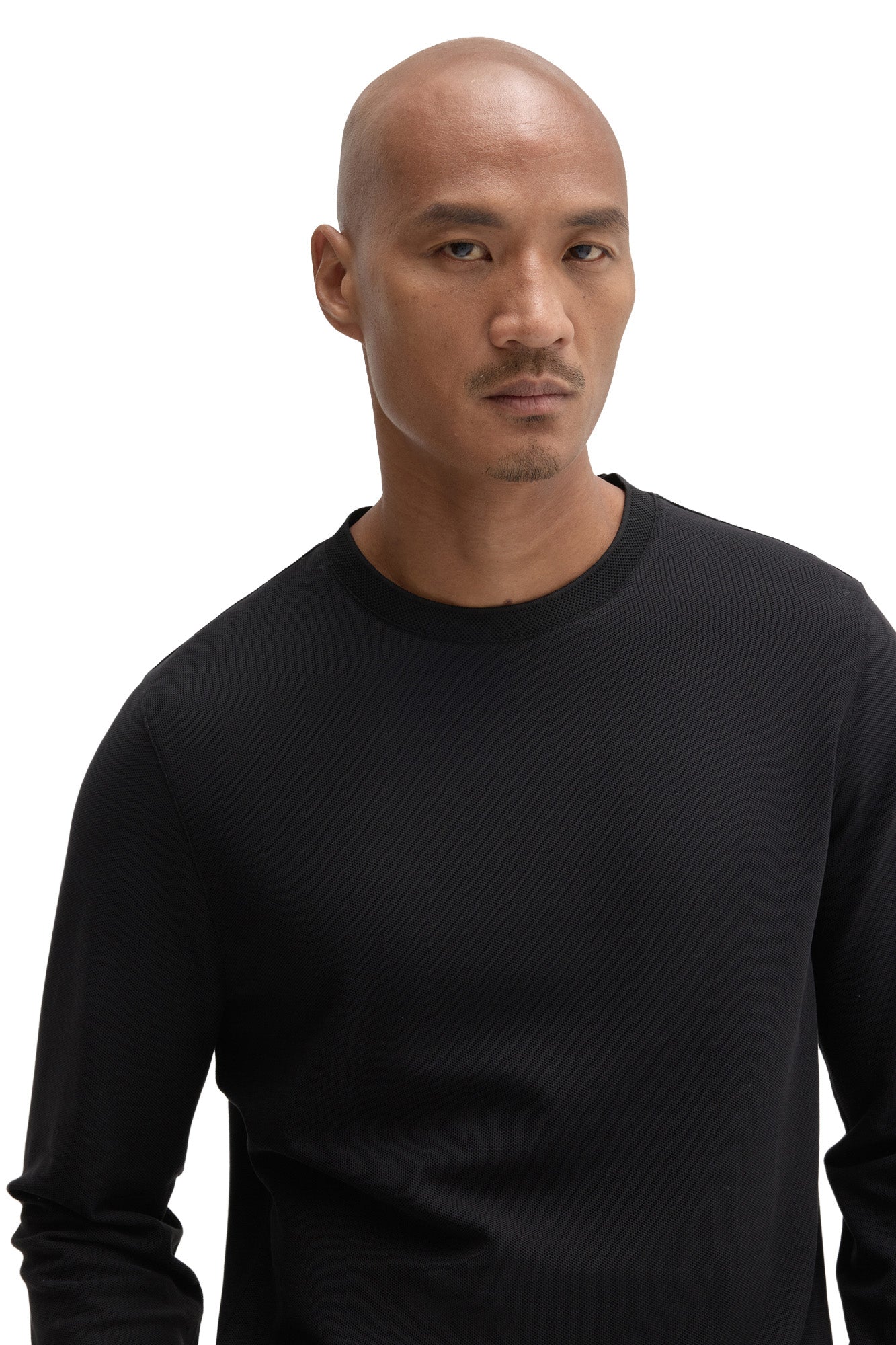 Robert Barakett men's close-up front view of black long sleeve T-Shirt with fine textured knit surface and crew neck