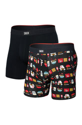 Front view of men's two black boxer underwear, one solid and one XX print, with logo elastic waistband by Saxx