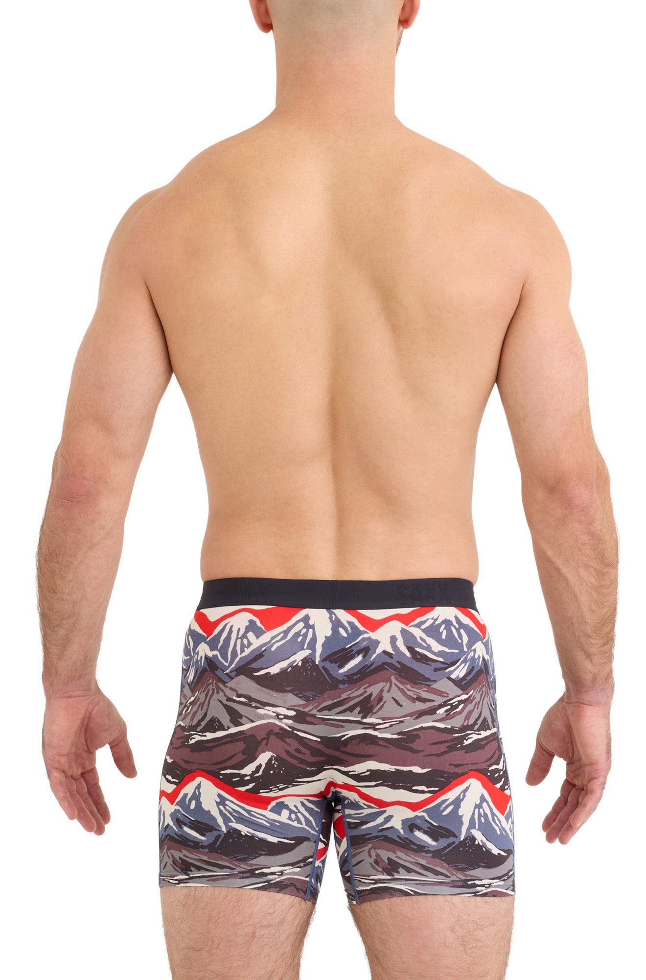 Saxx men's mountain-print boxer briefs with mid-thigh legs and black waistband shown from the back