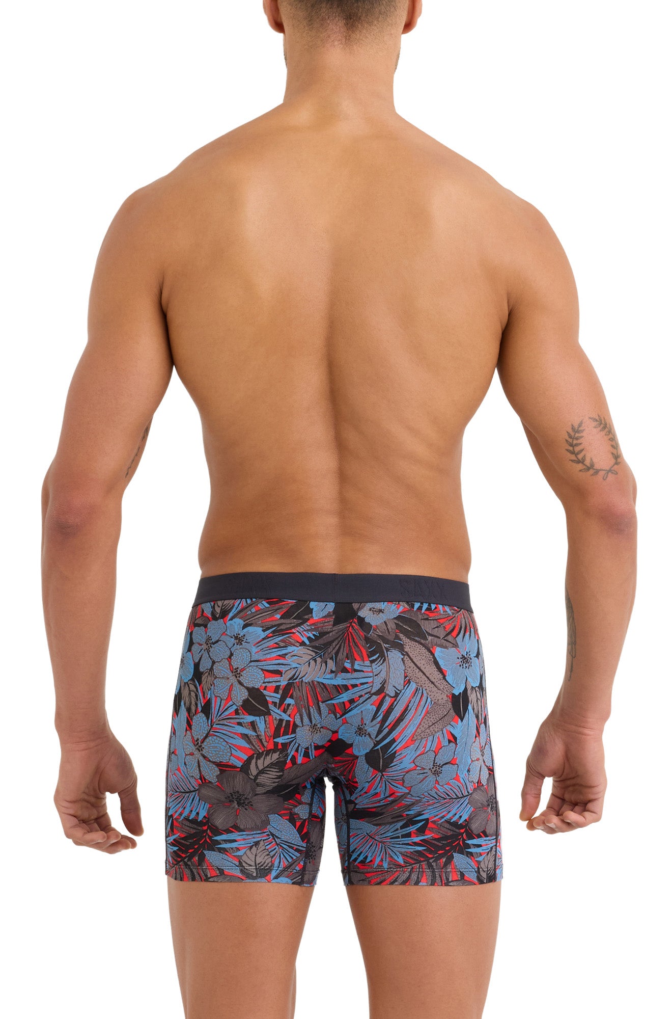 Back model view of men's red tropical floral boxer briefs with straight hems and black waistband by Saxx